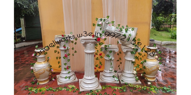 photo booth theme decoration for roman theme with roman pillars and pots