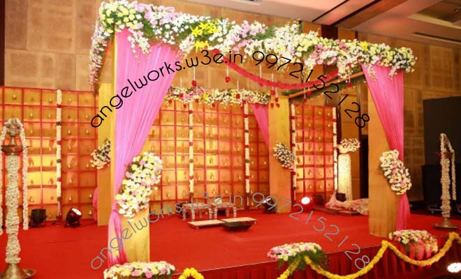 mandap decoration four pillars flowers all sides
